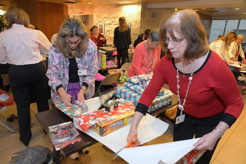 Santa’s Helpers Wrapping Party attendees Photo 6